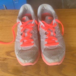 Nike tennis shoes worn down